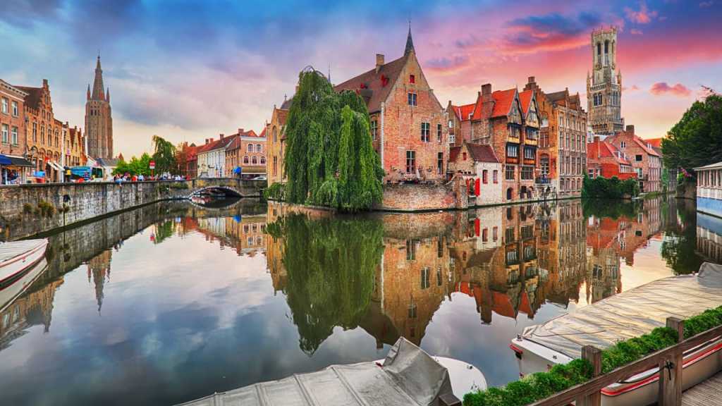 visit bruges or ghent